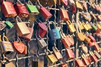 Padlocks attached to a railing